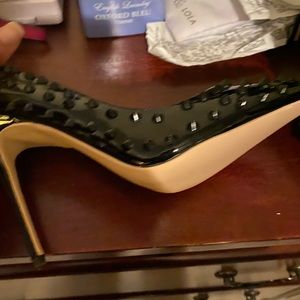 Black stilettos rivet shoes